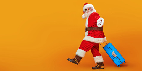 funny Santa with suitcase