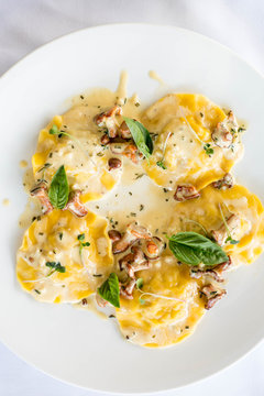 ravioli with mushrooms in a creamy sauce. Top view.