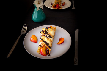 Crepes with Fresh Berries, Chocolate Sauce and Powdered sugar