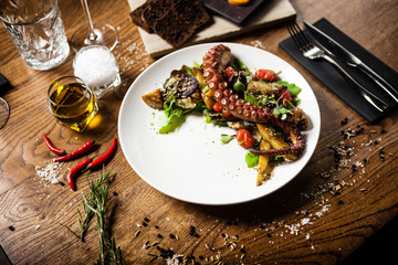 Octopus salad served on a plate in restaurant