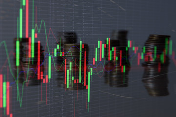 Stock market graph on the background of coins