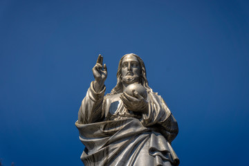 sculpture of jesus in the cemetery