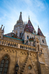 Fototapeta na wymiar The Cathedral of St Matthias on Castle Hill where the kings of Hungary were crowned. It stands close to the Fishermen's Bastion overlooking Budapest