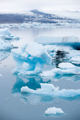 Icebergs swimming on Jokulsarlon glacier lagoon in Iceland