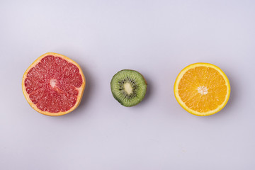Tasty Ripe Fruits on Blue Background Healthy Food Vitamin Diet or Detox Concept Flat Lay Top View