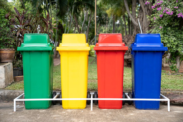 Waste separation concept, The Different Colored Bins in the public park for collection of recycled materials