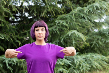 Woman with purple hair and t-shirt
