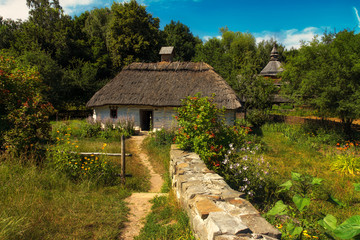 Fototapeta na wymiar reconstruction of an old house, which was built on the territory of Ukraine in rural areas in the 17-19th century