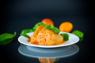 stuffed pepper with meat and vegetable sauce in a plate