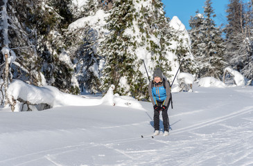 Woman skiing in Lapland Finland