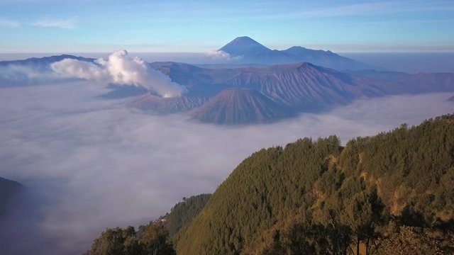 Aerial view drone flight at Bromo volcano at sunrise, East Java, Indonesia