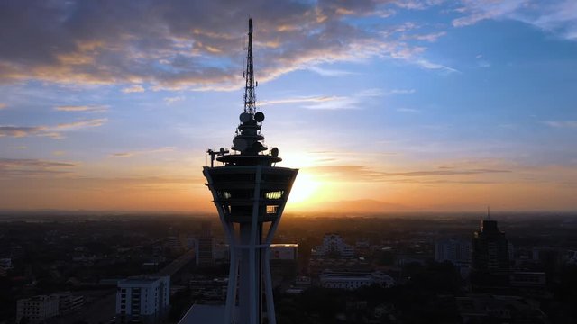 Aerial 4k footage of Alor Setar tower during sunrise. The Alor Setar Tower is 166 m tall and is the main telecommunications tower in the Malaysian state of Kedah.