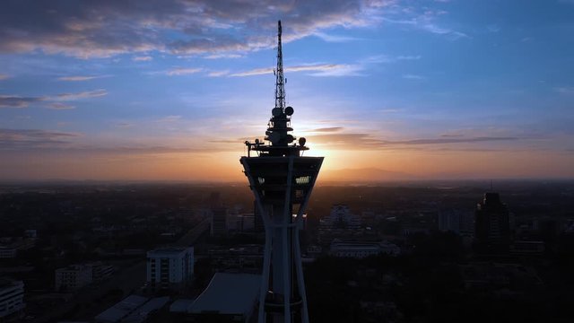 Aerial 4k footage of Alor Setar tower during sunrise. The Alor Setar Tower is 166 m tall and is the main telecommunications tower in the Malaysian state of Kedah.
