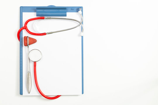 Medical Clipboard With Stethoscope On White Background With Copy Space