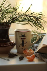 still life with tea and book