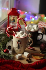 christmas candy, cup with marshmallows and decorations