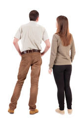 Back view of couple. beautiful friendly girl and guy together.