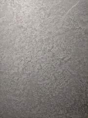 atmospheric background texture of cracked stucco