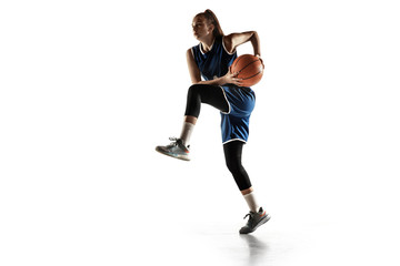Young caucasian female basketball player of team in action, motion in jump isolated on white...