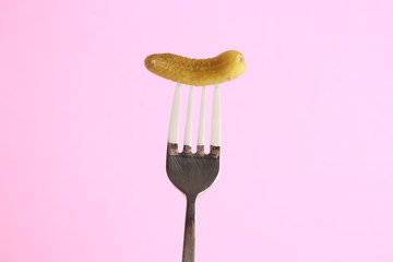 delicious gherkin in colorful background