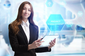 Business, Technology, Internet and network concept. Young businessman working on a virtual screen of the future and sees the inscription: Project management