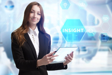 Business, Technology, Internet and network concept. Young businessman working on a virtual screen of the future and sees the inscription: Insight