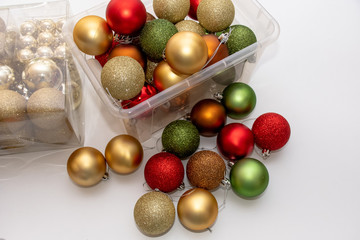 Christmas balls in a plastic transparent boxes ready to decorate a Christmas tree