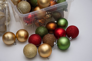 Christmas balls in a plastic transparent boxes ready to decorate a Christmas tree
