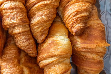 Freshly baked croissant. breakfast bread. French pastry. food and drink sandwich bread
