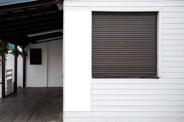 Blank white vertical banner on the wall