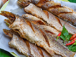 fried fish  delicious on the banana leaf