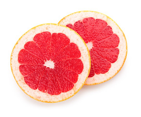 Fresh cut grapefruit on white background