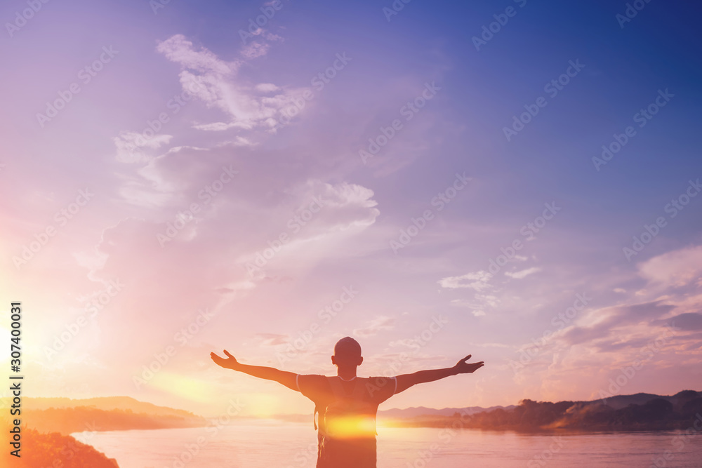 Poster happy backpack man raise hand up on sunset sky at river background. - Posters
