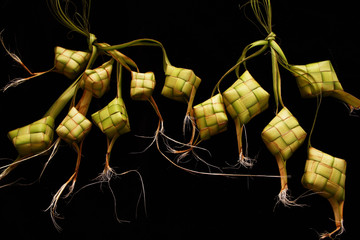 Ketupat is pouch made from woven young palm leaves
