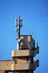 tower with antennas on roof