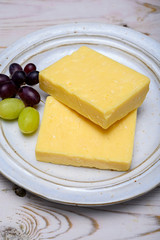 Cheese collection, blocks of matured english cheddar cheese