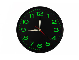 Black wall clock with green numbers isolated on white background