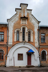 Fototapeta na wymiar Gate building of the farmstead of the Pskov-Pechersk monastery in Pskov