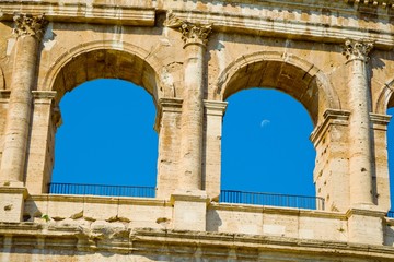 Moon in Arch of Colosseo in Rome