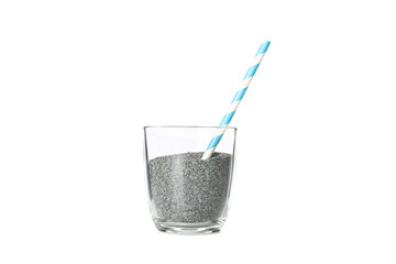 Glass with poppy and straw isolated on white background