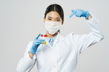 scientist in laboratory with test tubes