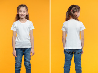 Kid girl wearing white t-shirt with space for your logo or design over yellow texture