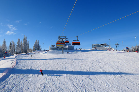  View from the ski lift on the ski slope in popular winter resort Kotelnica Bialczanska.
