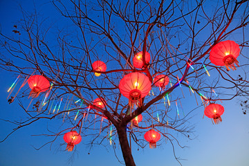 Red lanterns are in the blue sky.