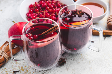 Cups of tasty mulled wine on table
