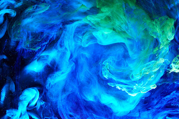 Fototapeta na wymiar Abstract blue green background, underwater art. Colorful swirling paint smoke