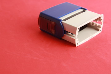 Automatic ink stamp manufactured in blue plastic