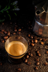 Old coffee pot on dark rustic background