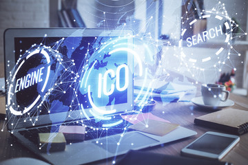 Multi exposure of blockchain theme hologram and table with computer background. Concept of bitcoin...