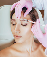 woman with getting beauty injections. Botulinum toxin injection for remove wrinkle